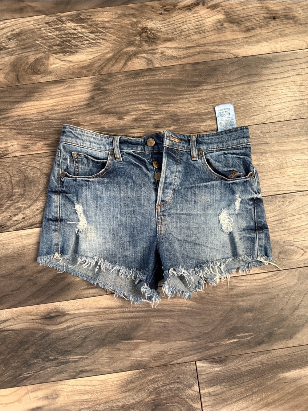 Guess Distressed Denim Shorts in Light Blue